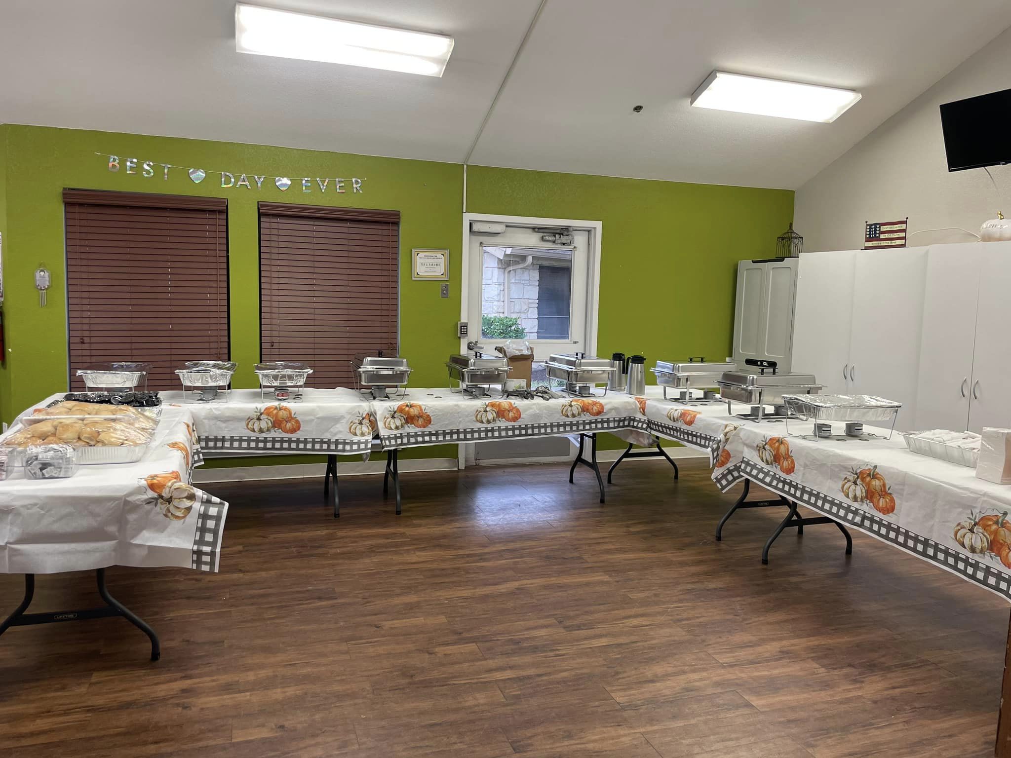 Dining area set up for a special event with food