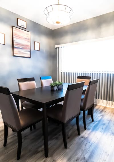 Dining area with a wooden table and chairs