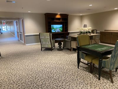 Common area with seating and television