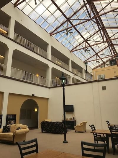 Bright interior common area with large windows
