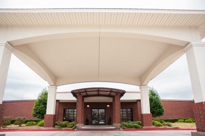 Front entrance of Riverview Care Center with covered area