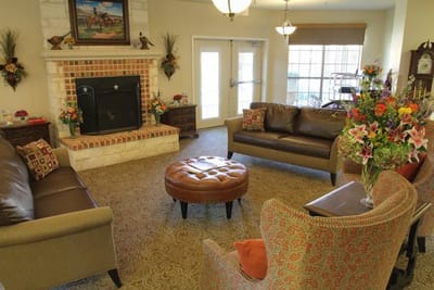 Cozy common area with seating and flowers