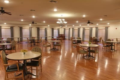 Bright dining area with tables and chairs