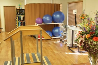 Interior view of a therapy area with exercise equipment