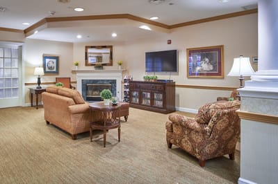Cozy common area with seating and fireplace