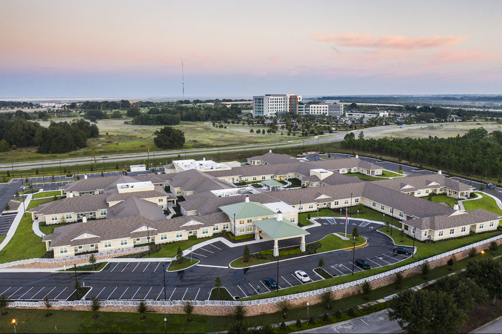 Aerial view of The Club at Lake Gibson facility with landscaping