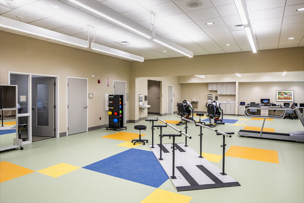 Interior view of a rehabilitation gym with equipment