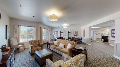 A cozy common area with seating and decor