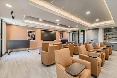 Common area with seating and entertainment setup