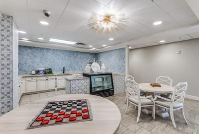 Modern common area with kitchen and dining table