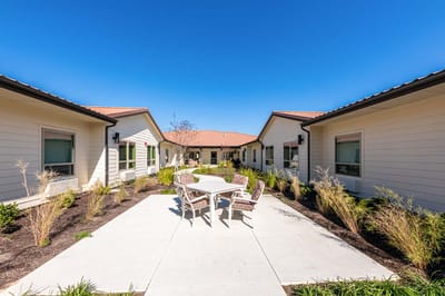 Outdoor courtyard with seating and pathways