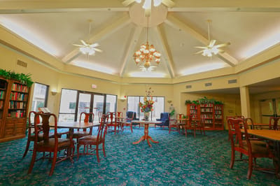 Common area with comfortable seating and bookshelves