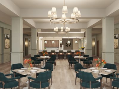 Modern dining room with tables and chairs set for meals