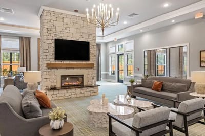 Modern common area with fireplace and seating