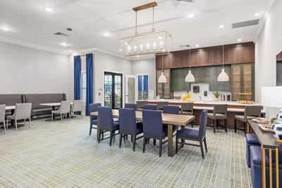 Bright dining room with tables and chairs