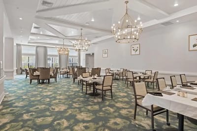 Dining area with tables and chandeliers