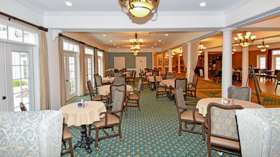 Interior view of a dining area with tables and chairs