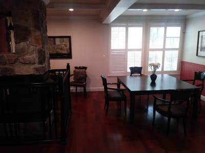 Common area with a table and chairs in an interior space