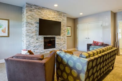 Cozy common area with a fireplace and seating