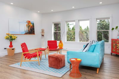Bright common area with colorful furniture