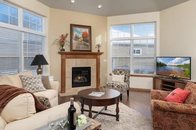 Cozy common area with a fireplace and seating