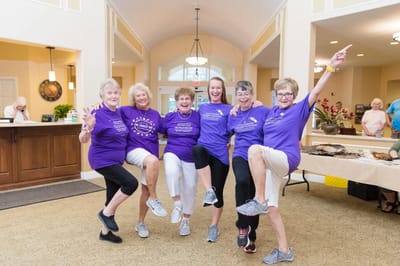 Residents celebrating and engaging in a fun activity