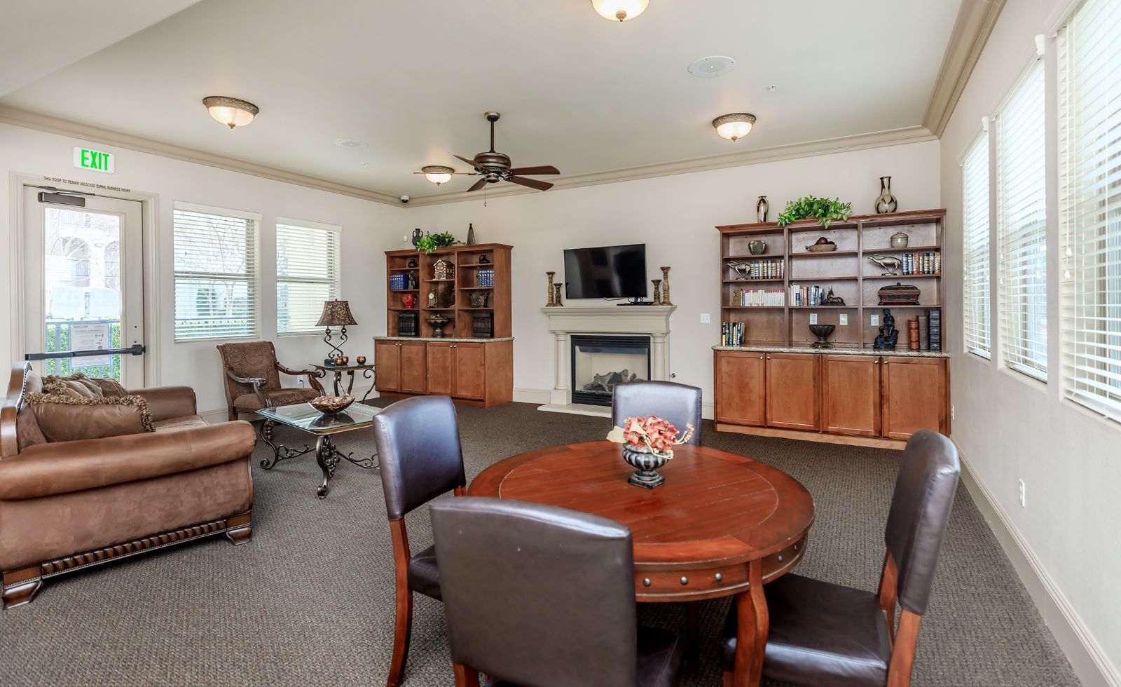 Cozy common area with seating and shelves