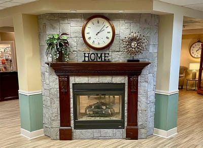 Cozy interior in a senior living facility with a fireplace