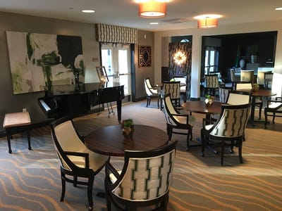 Bright common area with tables and chairs