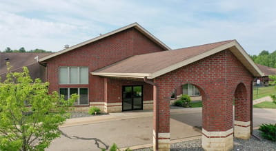 Exterior view of the Willow Brooke Point Senior Living building