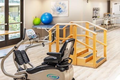 Rehabilitation equipment in a bright therapy room