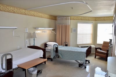 Interior view of a shared resident room with two beds