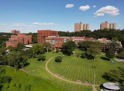 Aerial view of RiverSpring Living's beautiful campus and outdoor spaces