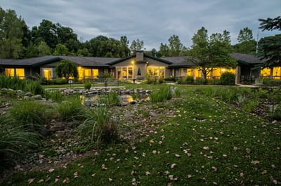 Exterior view of Stoneleigh Residence with garden