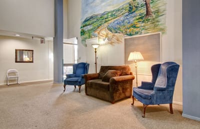 Cozy common area with seating and artwork