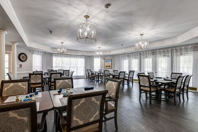 Spacious dining room with elegantly set tables
