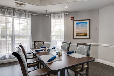 Dining area set for mealtime with decor