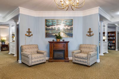 Common area with seating and decorative artwork