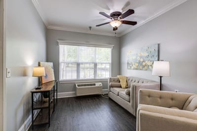 Cozy lounge area with seating and natural light
