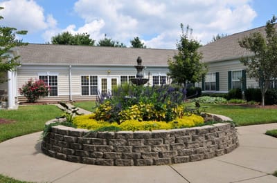 Beautiful outdoor space with landscaped garden and fountain