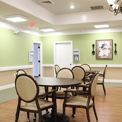 Interior view of a dining area with tables and chairs