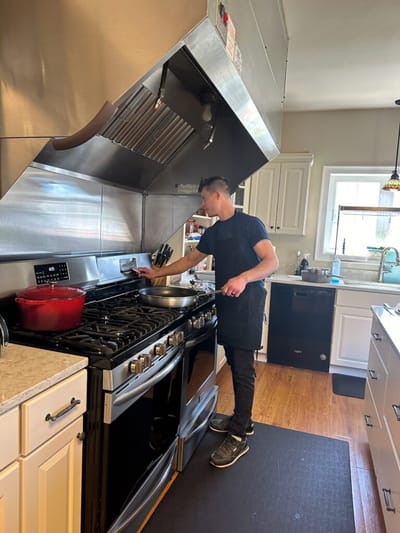 Staff preparing food in the facility kitchen