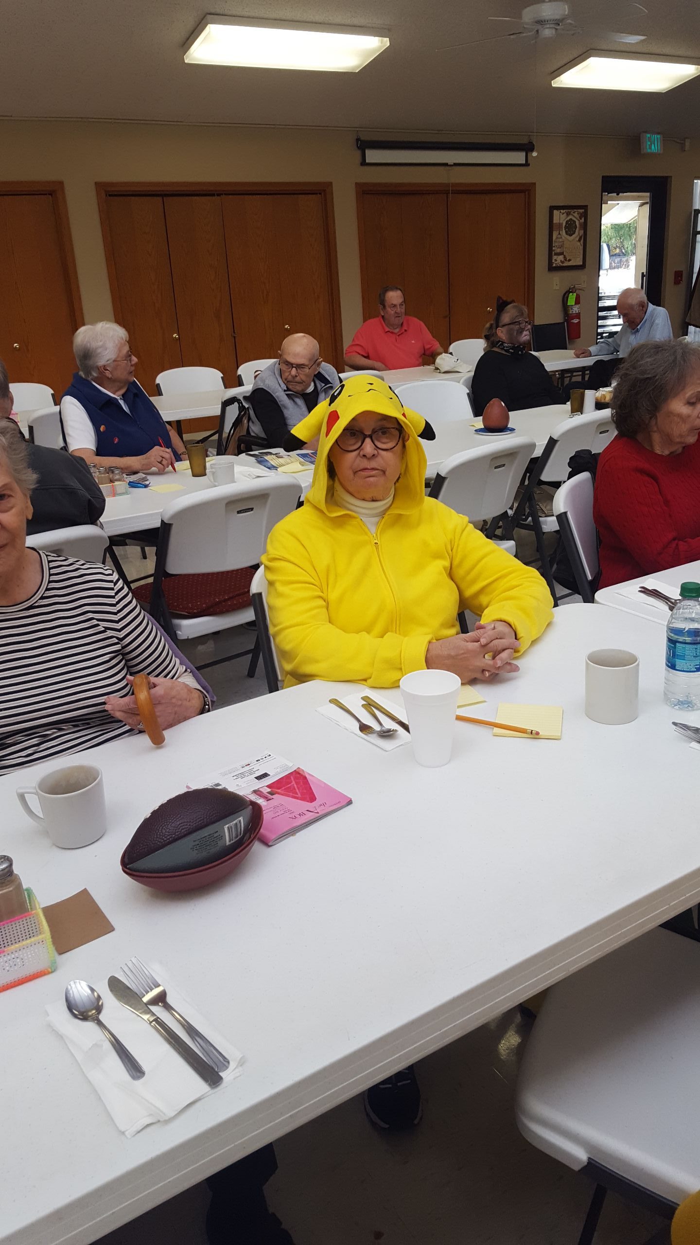 Residents enjoying activities in a cheerful common area