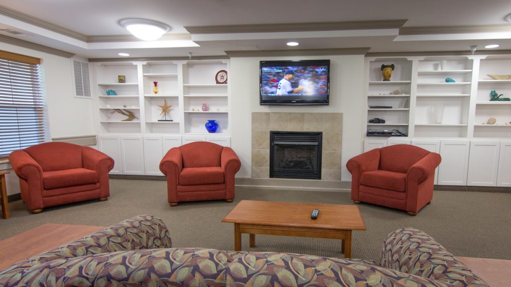Common area with seating and a TV