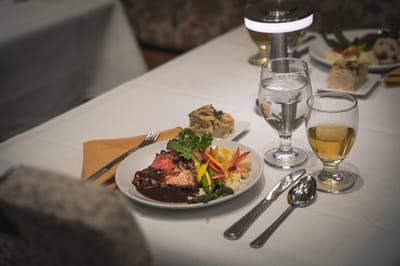 Elegant dining setup with meals served on the table