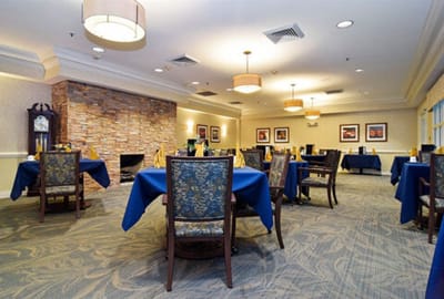 Dining area with tables set for a meal