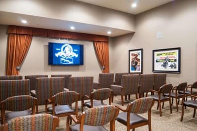 Interior view of a facility theater room with seats