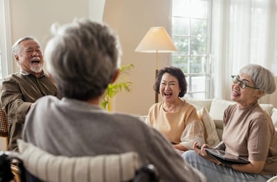 Residents enjoying a light-hearted moment in a common area
