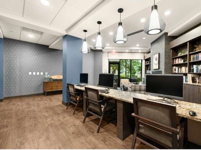 Modern computer station in a bright common area