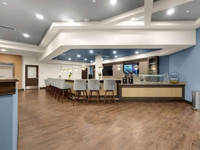 Bright dining area with a modern design and seating